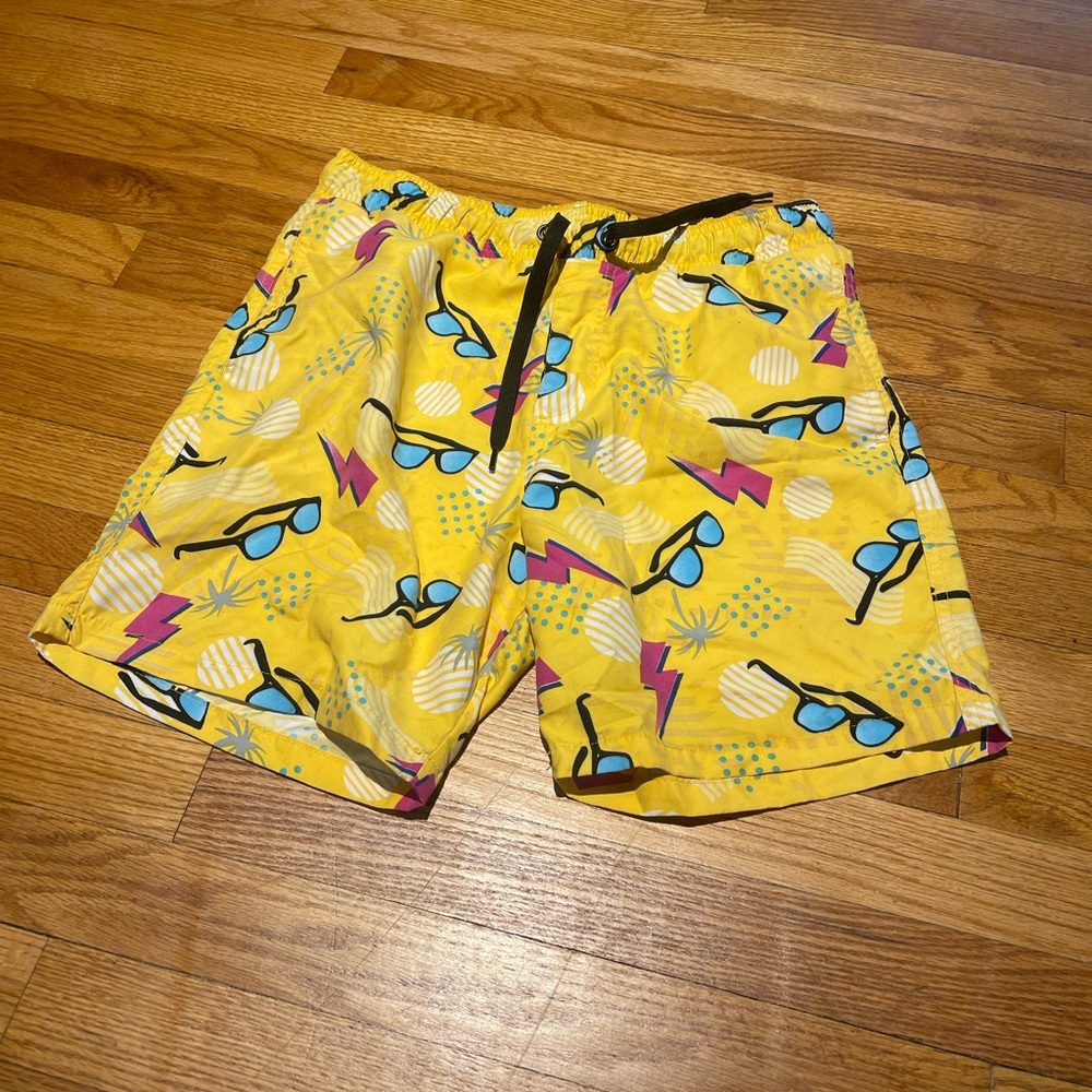 Sunglasses and lightning bolts pattern boys swim trunks